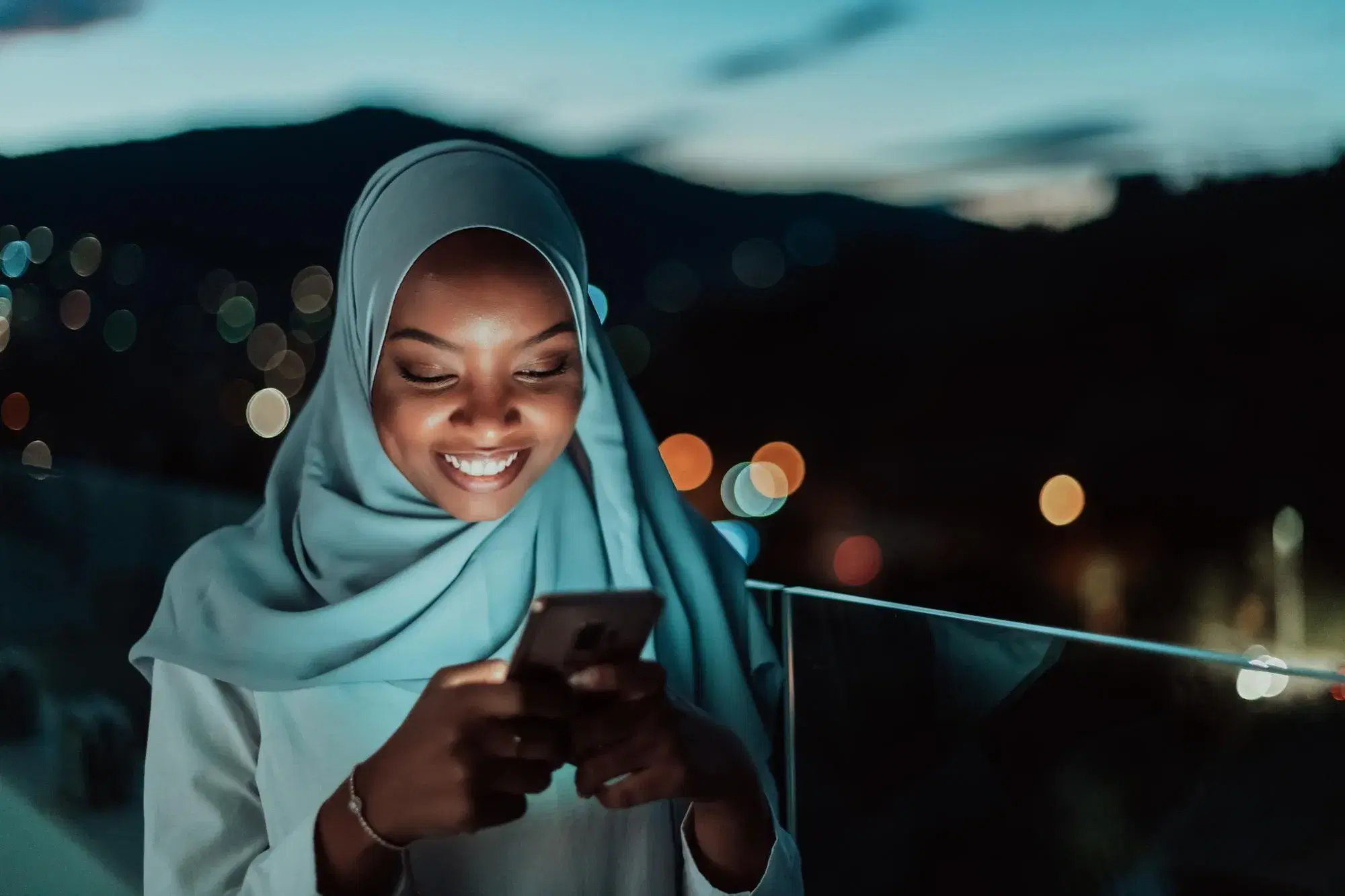 Investor reviewing ethical investment options on her phone